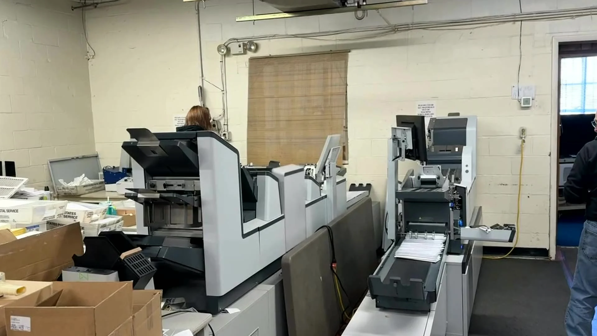 Mail Movers production mail-inserting equipment processing direct-mail pieces.